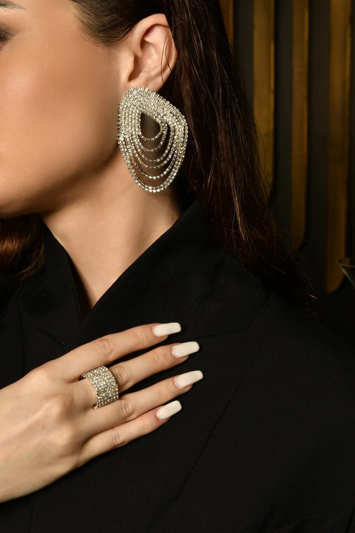 White Finish Rhinestone Fluid Dangler Earrings by MNSH at Pernia's Pop Up Shop