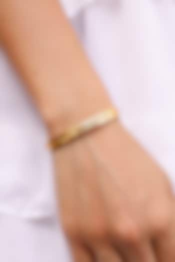 Gold Finish Gayatri Mantra Cuff by MNSH at Pernia's Pop Up Shop