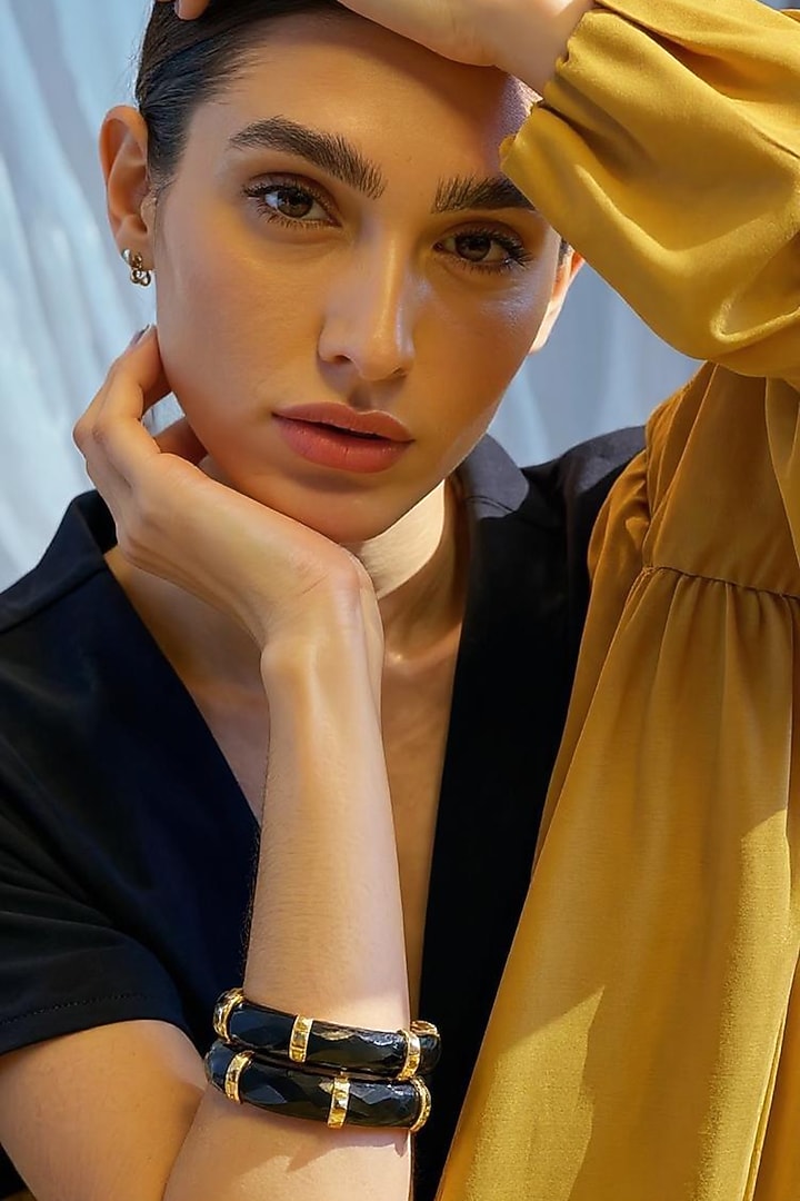 Gold Plated Black Cubic Zirconia Bangles (Set of 2) by MNSH at Pernia's Pop Up Shop