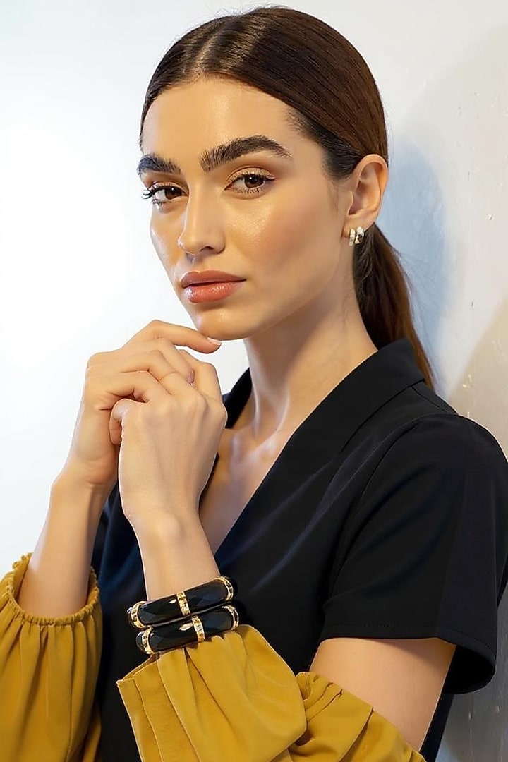 Gold Plated Black Cubic Zirconia Bangles (Set of 2) by MNSH at Pernia's Pop Up Shop