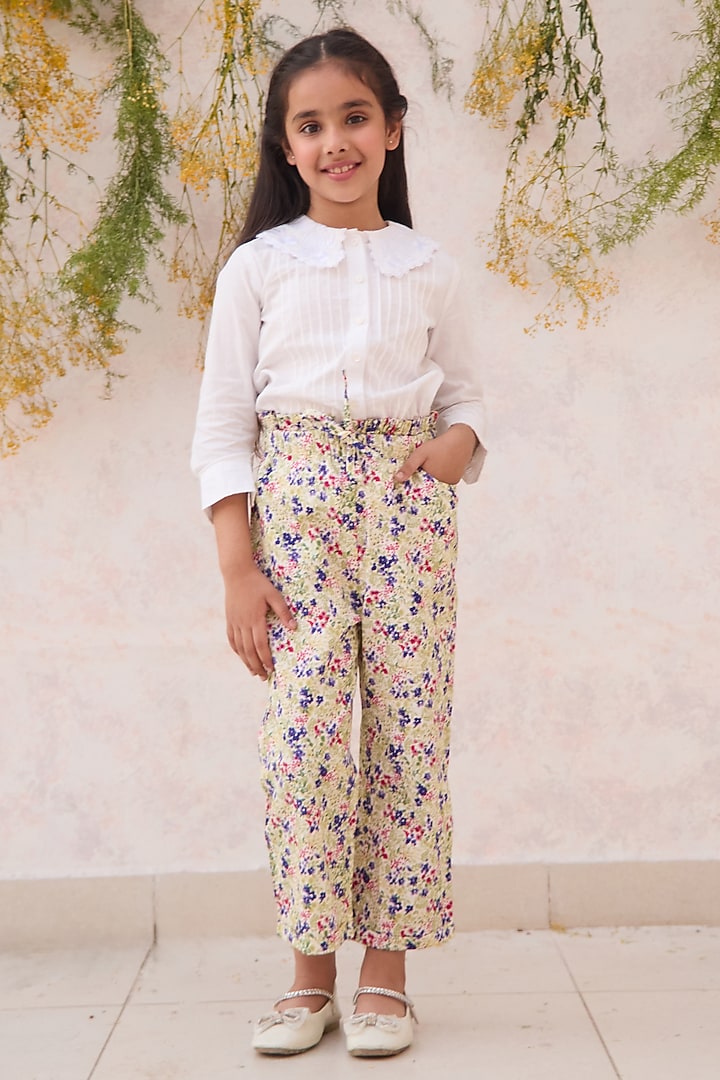 Yellow Poplin Floral Printed Trouser For Girls by MINI TRAILS at Pernia's Pop Up Shop