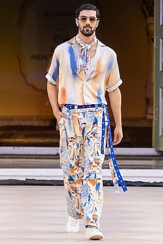 Yellow Denim Twill Printed Trousers by Mandira Wirk Men
