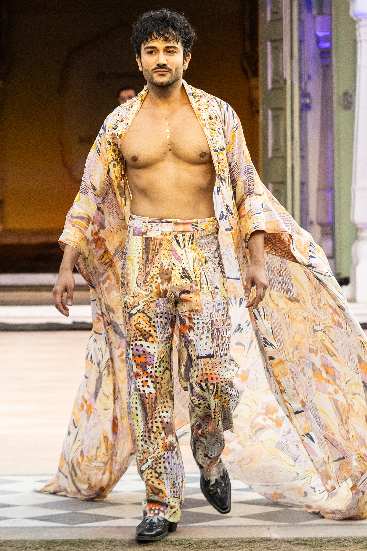Yellow Foma Fabric Printed Trousers by Mandira Wirk Men