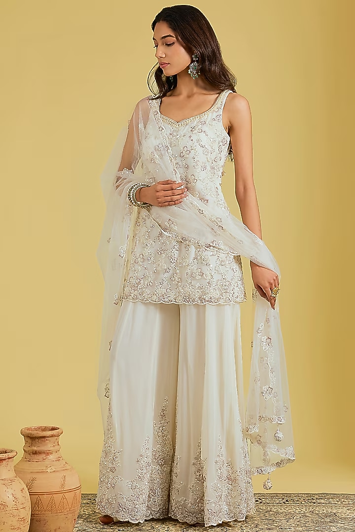 Ivory Net & Georgette Embroidered Wedding Sharara Set by MeenaGurnam at Pernia's Pop Up Shop