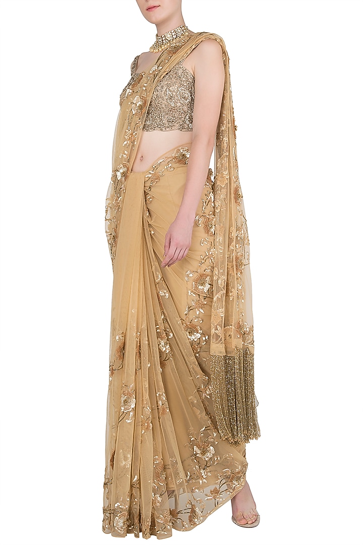 Gold sequins embroidered saree set available only at Pernia's Pop Up Shop.
