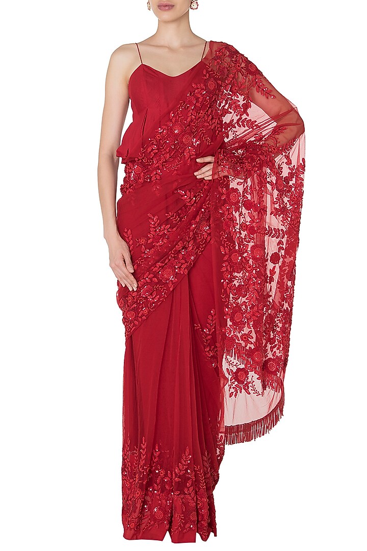 Red floral emboridered saree with peplum blouse available only at Pernia's Pop Up Shop.