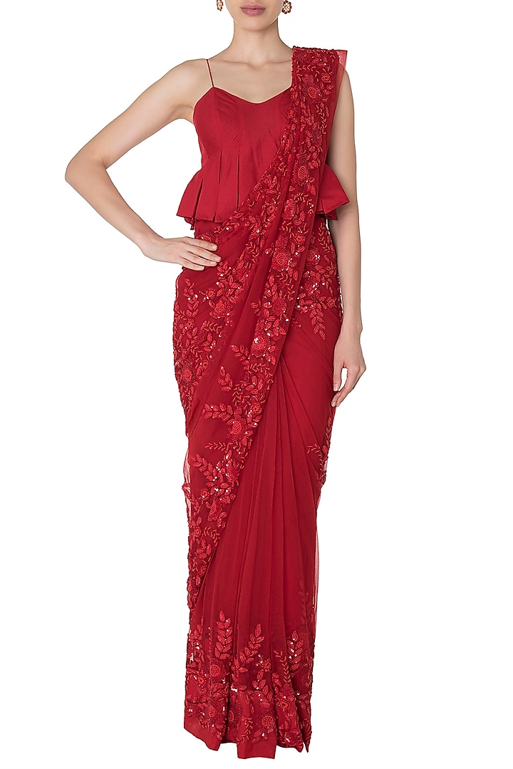 Red floral emboridered saree with peplum blouse available only at Pernia's Pop Up Shop.