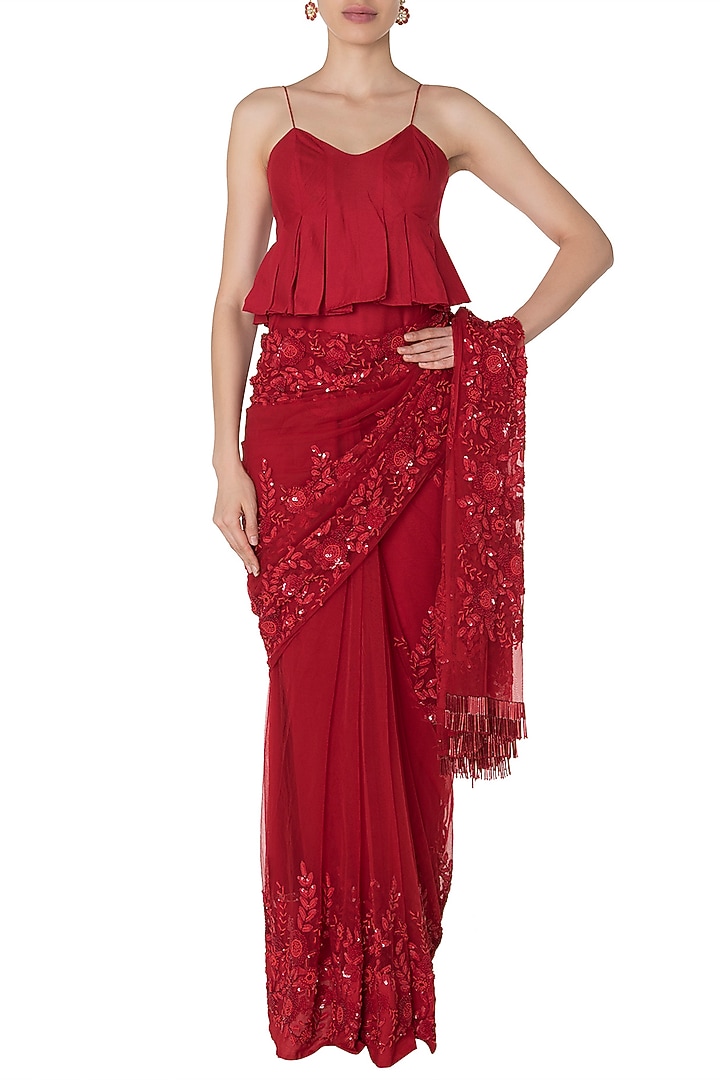Red floral emboridered saree with peplum blouse available only at Pernia's Pop Up Shop.
