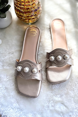 Gold Artificial Leather Pearl Embellished Handmade Flats by Modanta
