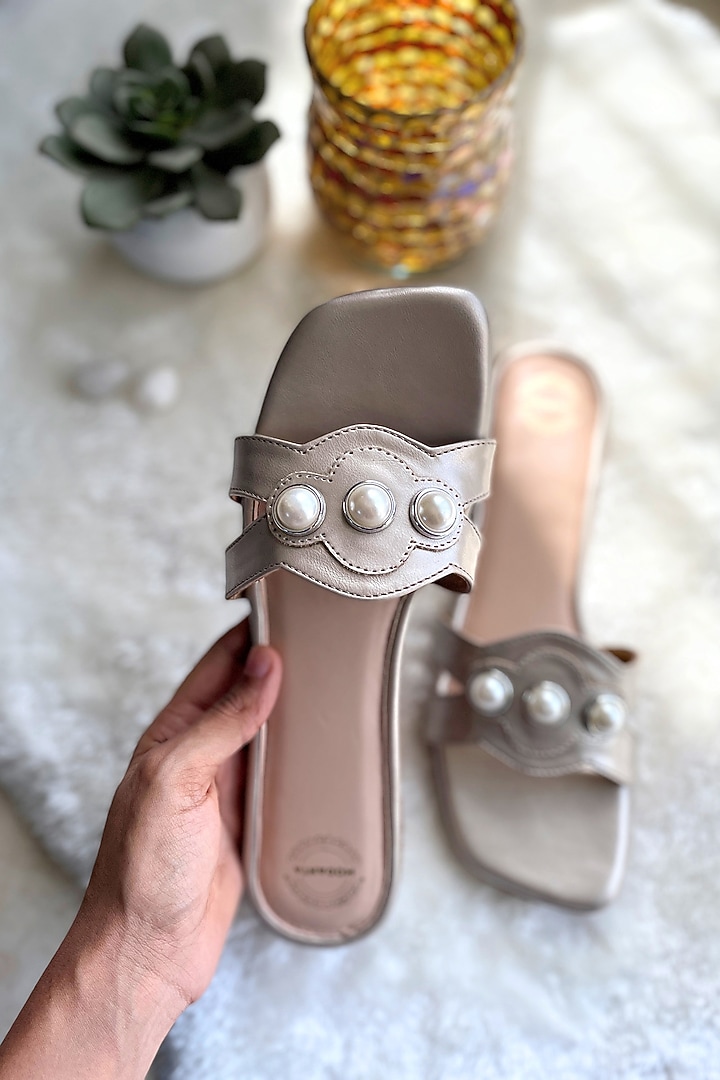 Gold Artificial Leather Pearl Embellished Handmade Flats by Modanta at Pernia's Pop Up Shop