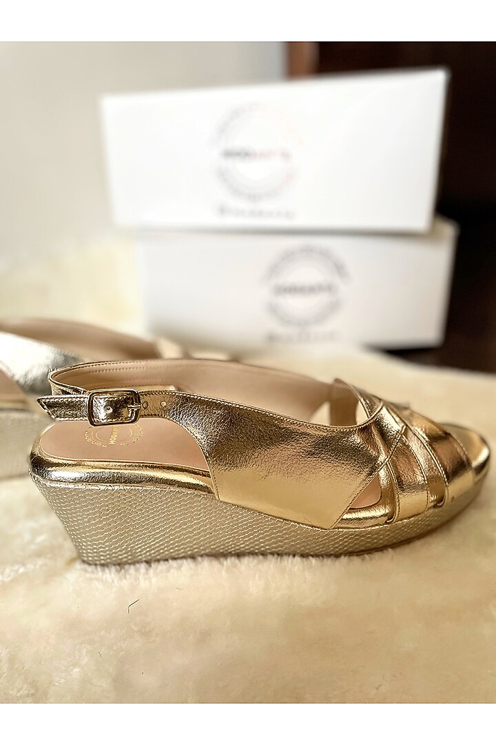 Gold Artificial Leather Handmade Wedges by Modanta at Pernia's Pop Up Shop