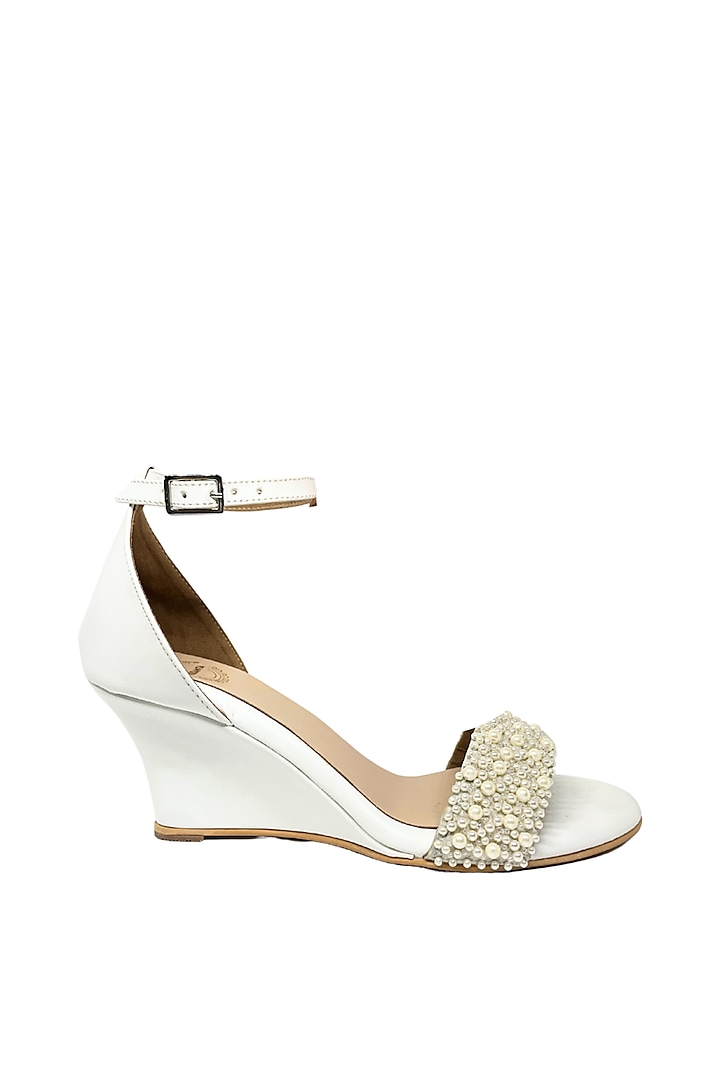 White Artificial Leather Pearl Embroidered Wedges by Modanta