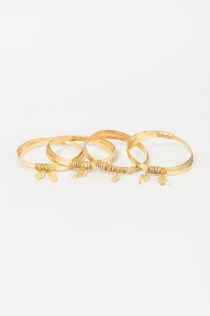 Gold Finish Freshwater Pearl Bangles (Set of 4) by Mine of Design at Pernia's Pop Up Shop