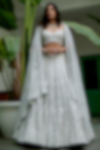 White Silver Brocade Hand Embellished Bridal Lehenga Set by MOLEDRO at Pernia's Pop Up Shop