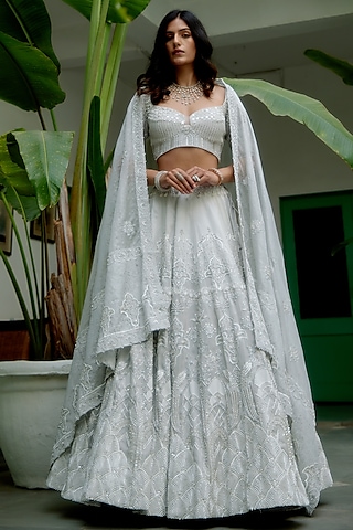 White Silver Brocade Hand Embellished Lehenga Set by MOLEDRO