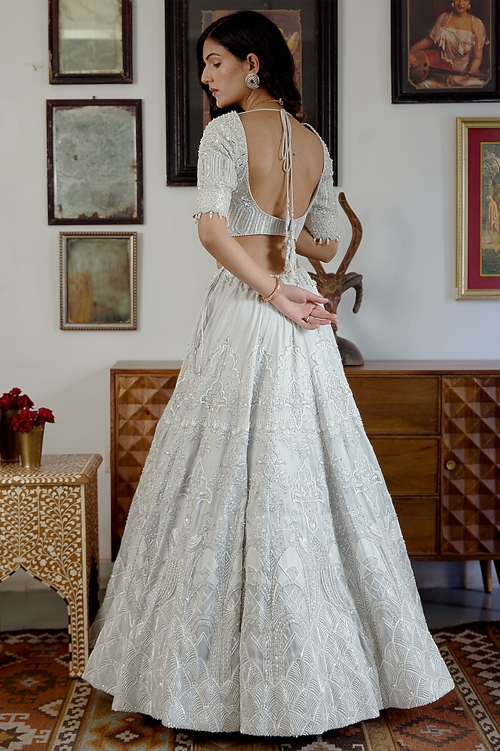 White Silver Brocade Hand Embellished Bridal Lehenga Set by MOLEDRO at Pernia's Pop Up Shop