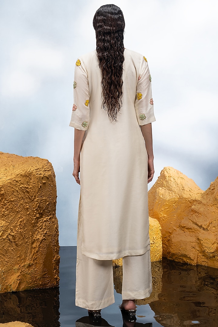 Ivory Dupion Silk Crystal Embroidered Straight Kurta Set by Mona & Vishu at Pernia's Pop Up Shop