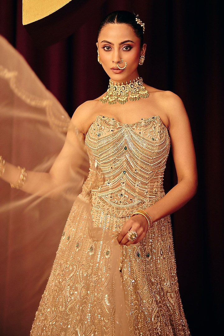 Golden Net & Pearl Sheen Organza Bridal Lehenga Set by Label Moni K at Pernia's Pop Up Shop