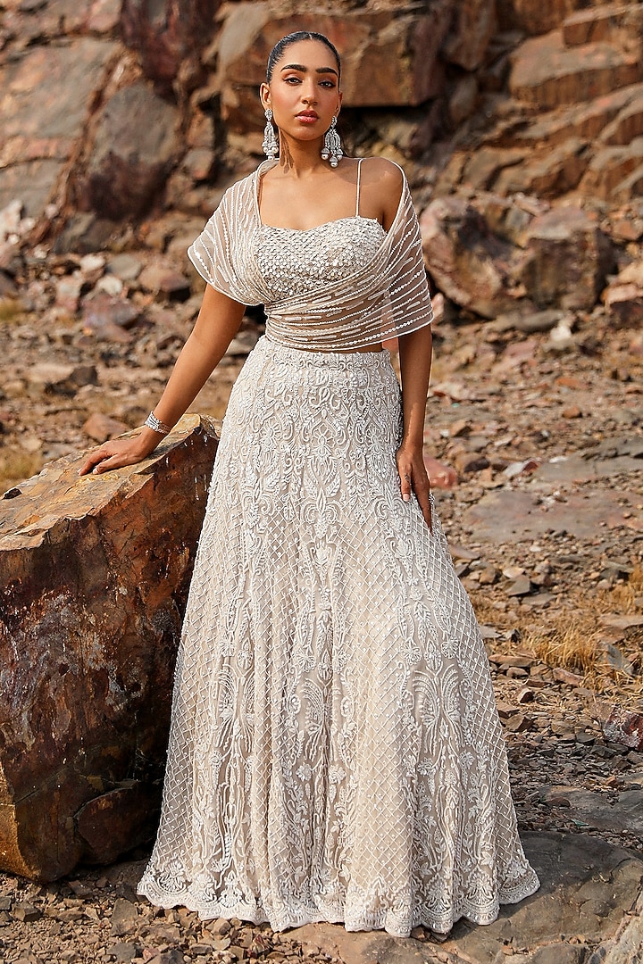 Nude Net Floral Hand Embroidered Wedding Lehenga Set by Label Moni K at Pernia's Pop Up Shop