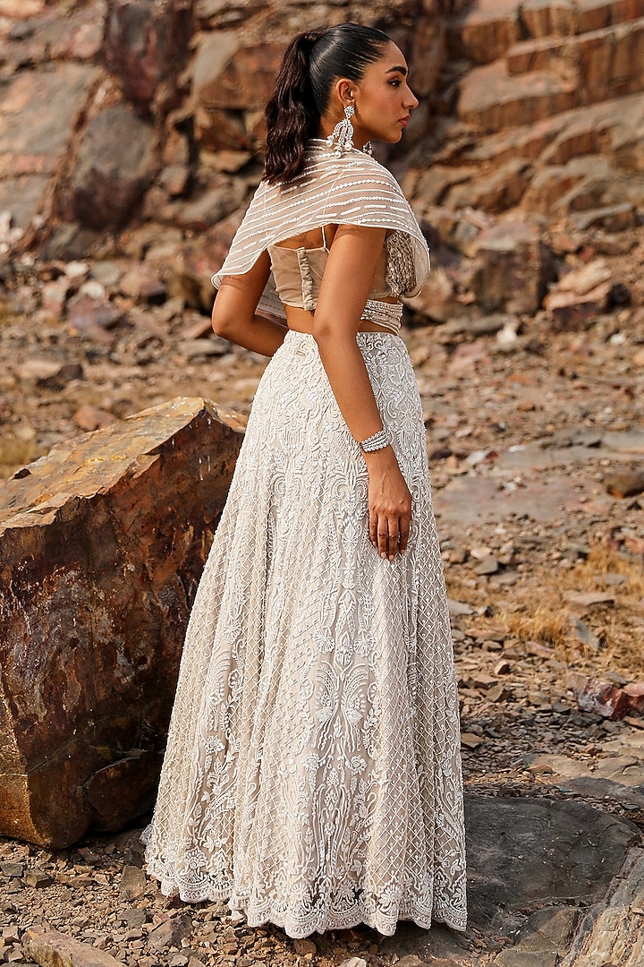 Nude Net Floral Hand Embroidered Wedding Lehenga Set by Label Moni K at Pernia's Pop Up Shop