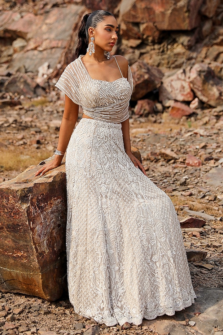Nude Net Floral Hand Embroidered Wedding Lehenga Set by Label Moni K at Pernia's Pop Up Shop