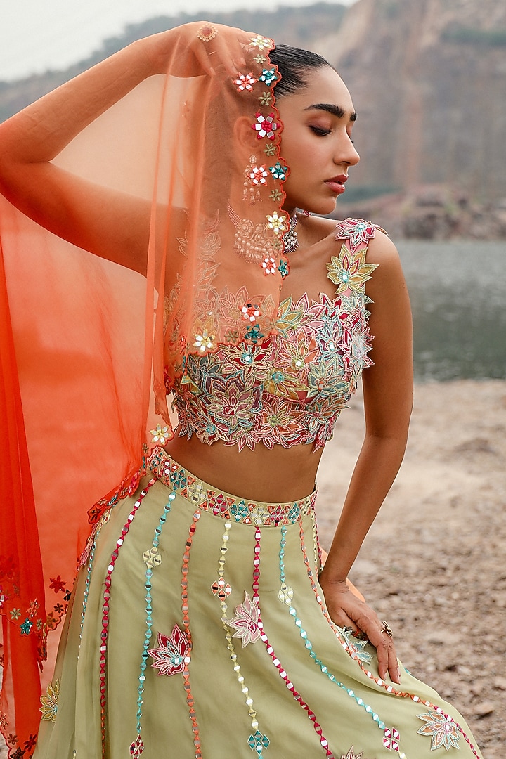Green & Orange Net Applique Embroidered Wedding Lehenga Set by Label Moni K at Pernia's Pop Up Shop