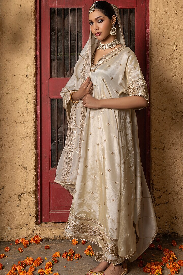 Gold Banarasi Silk Tissue Blend Embroidered Kurta Set by Monk & Mei at Pernia's Pop Up Shop