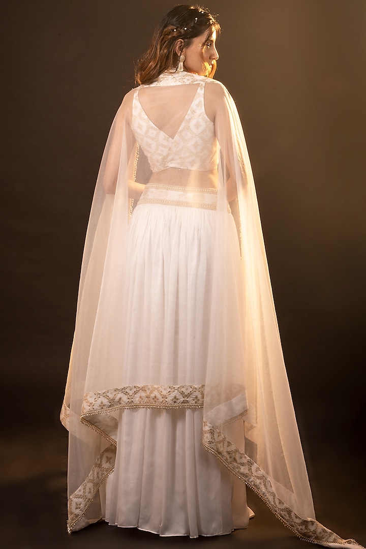 White Silk Brocade Silk Lehenga Set by Monk & Mei at Pernia's Pop Up Shop