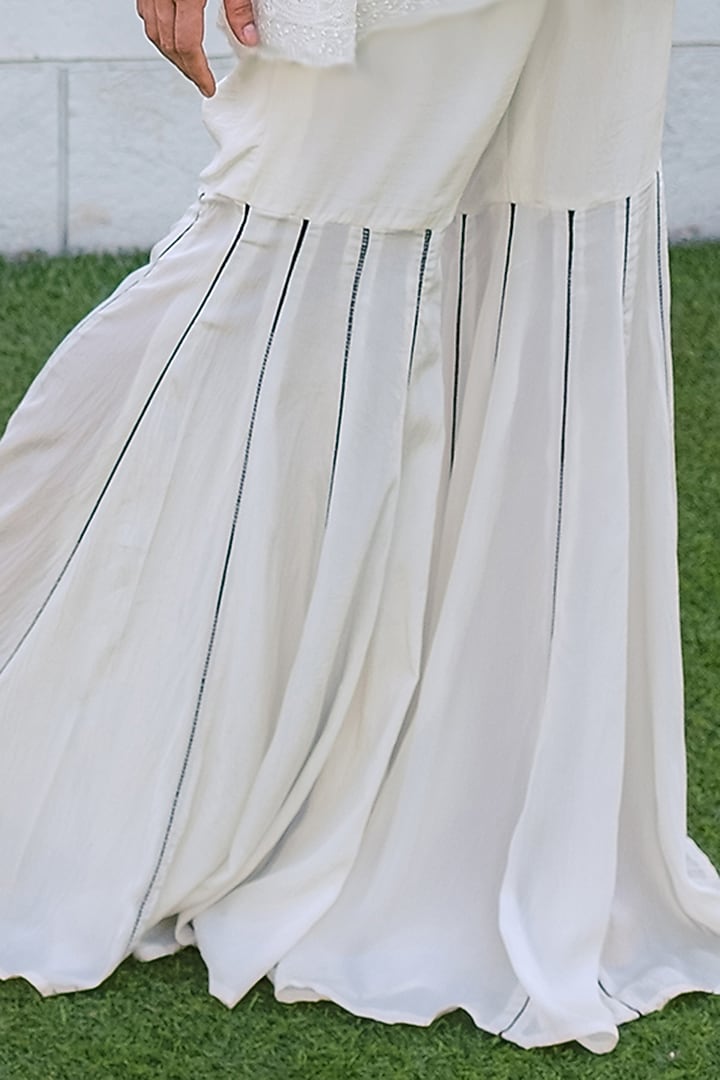 White Georgette Sharara Set by Monk & Mei at Pernia's Pop Up Shop