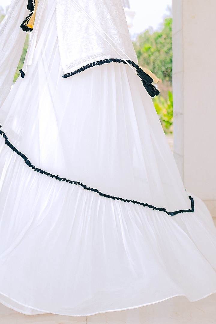 White Chikankari Flared Skirt Set by Monk & Mei at Pernia's Pop Up Shop