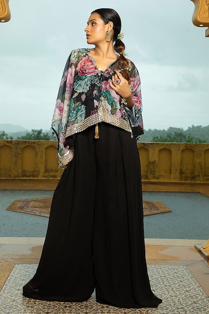 Black Georgette Jumpsuit With Floral Printed Cape by Monk & Mei at Pernia's Pop Up Shop