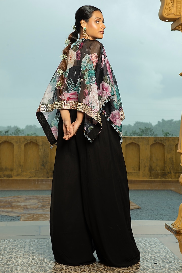 Black Georgette Jumpsuit With Floral Printed Cape by Monk & Mei at Pernia's Pop Up Shop