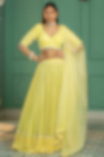 Yellow Georgette Embroidered Pleated Lehenga Set by Monk & Mei at Pernia's Pop Up Shop