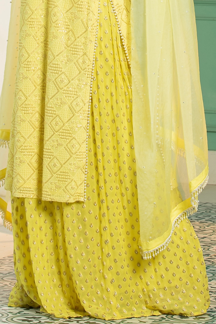 Yellow Georgette Sequins Embroidered Kurta Set by Monk & Mei at Pernia's Pop Up Shop