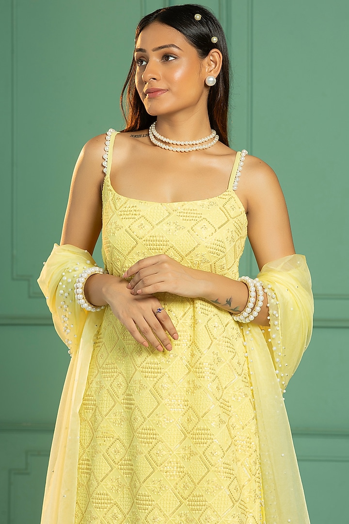 Yellow Georgette Sequins Embroidered Kurta Set by Monk & Mei at Pernia's Pop Up Shop