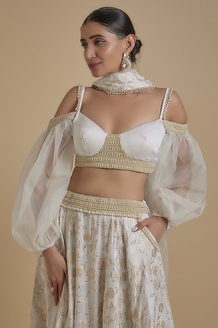 White Pink Brocade & Organza Layered Lehenga Set by Monk & Mei at Pernia's Pop Up Shop