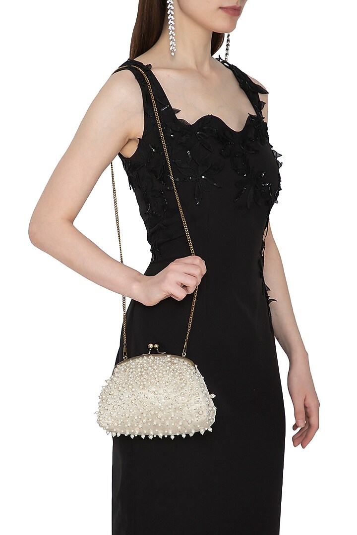 Off White Pearl Embroidered Potli by MKNY at Pernia's Pop Up Shop
