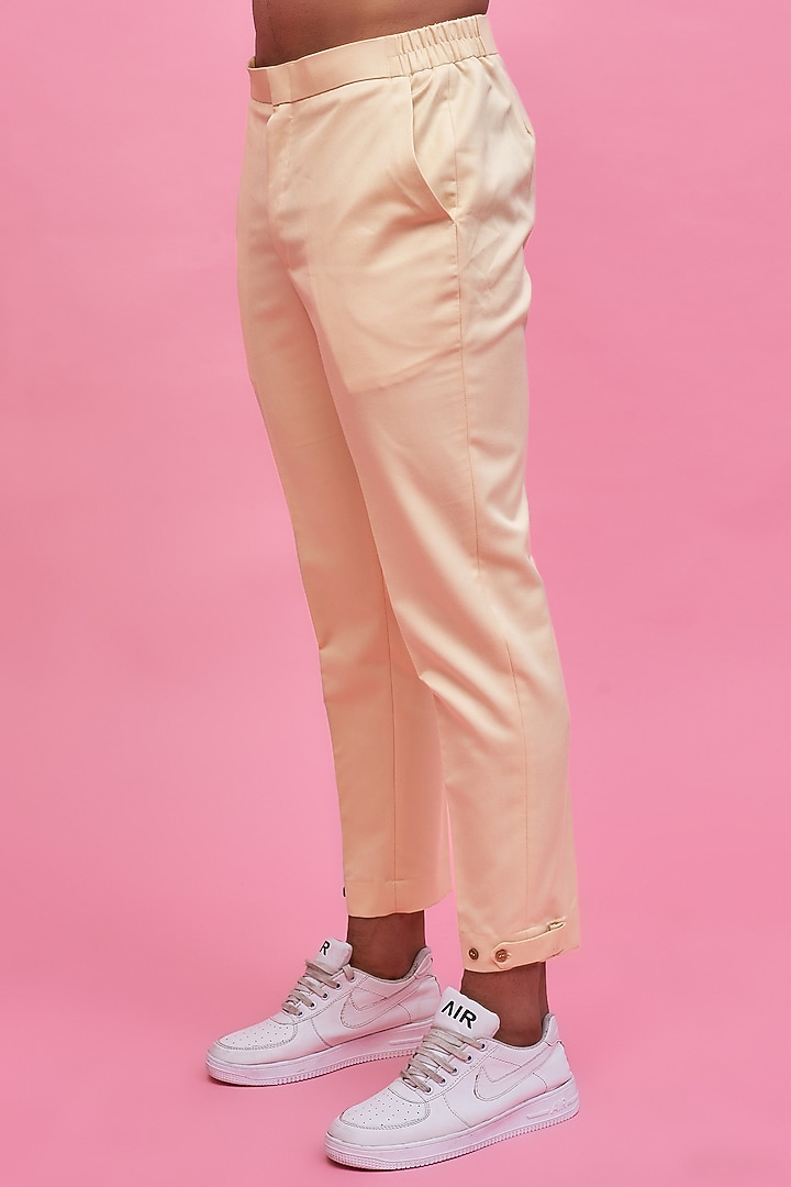 Beige Terry Rayon Pants by MOOHDY at Pernia's Pop Up Shop