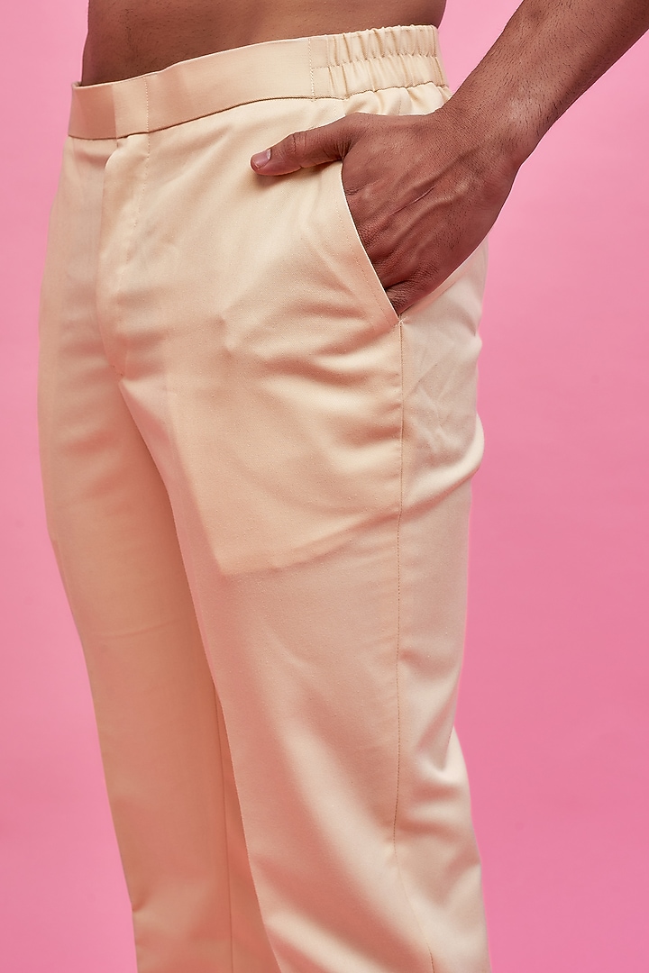 Beige Terry Rayon Pants by MOOHDY at Pernia's Pop Up Shop