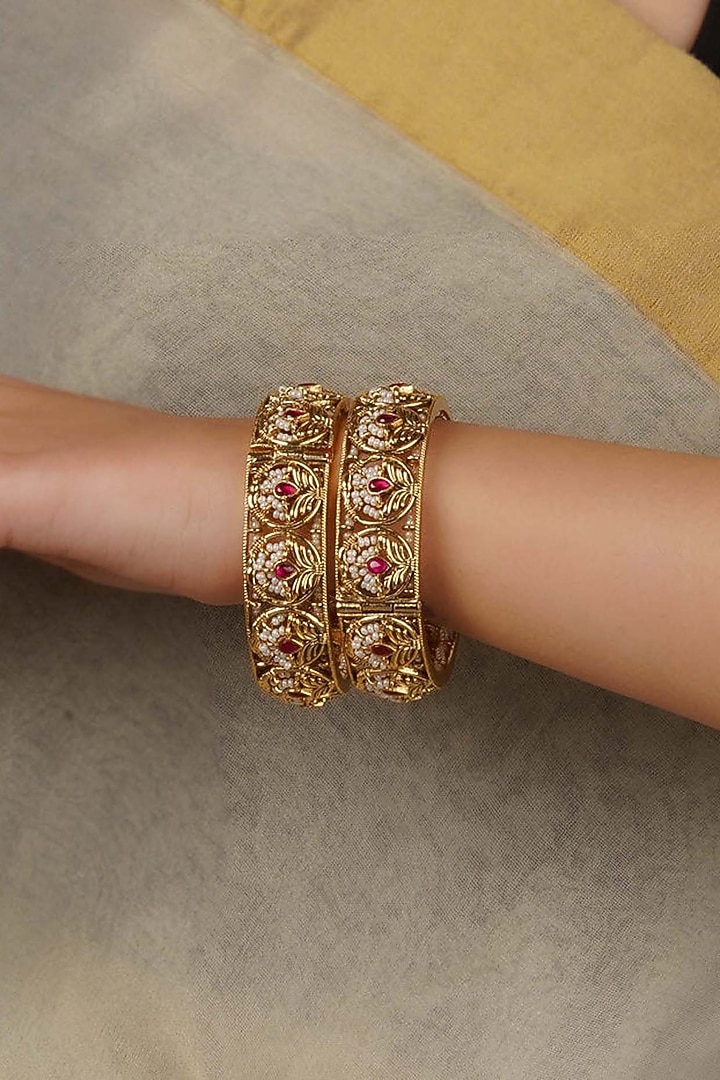 Gold Plated Uncut Polki & Beaded Jadau Bangles (Set Of 2) by Mortantra at Pernia's Pop Up Shop
