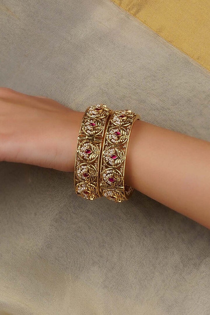 Gold Plated Uncut Polki & Beaded Jadau Bangles (Set Of 2) by Mortantra at Pernia's Pop Up Shop