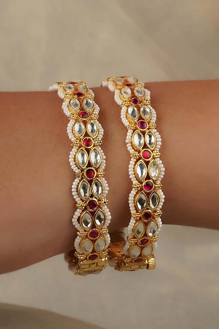 Gold Plated Uncut Polki & Beaded Jadau Bangles (Set Of 2) by Mortantra at Pernia's Pop Up Shop