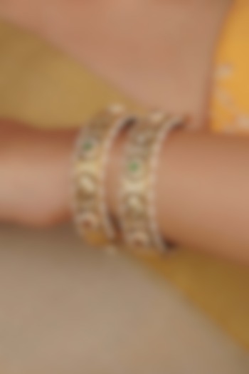 Gold Plated Uncut Polki & Beaded Jadau Bangles (Set Of 2) by Mortantra at Pernia's Pop Up Shop