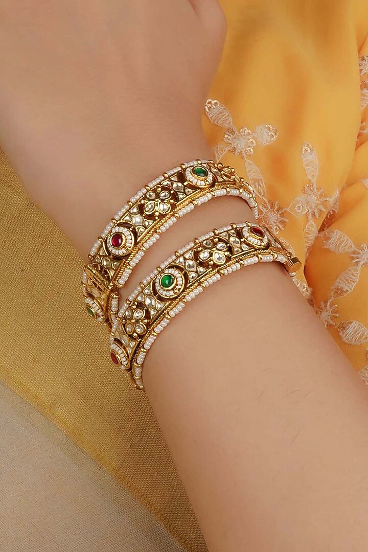 Gold Plated Uncut Polki & Beaded Jadau Bangles (Set Of 2) by Mortantra at Pernia's Pop Up Shop