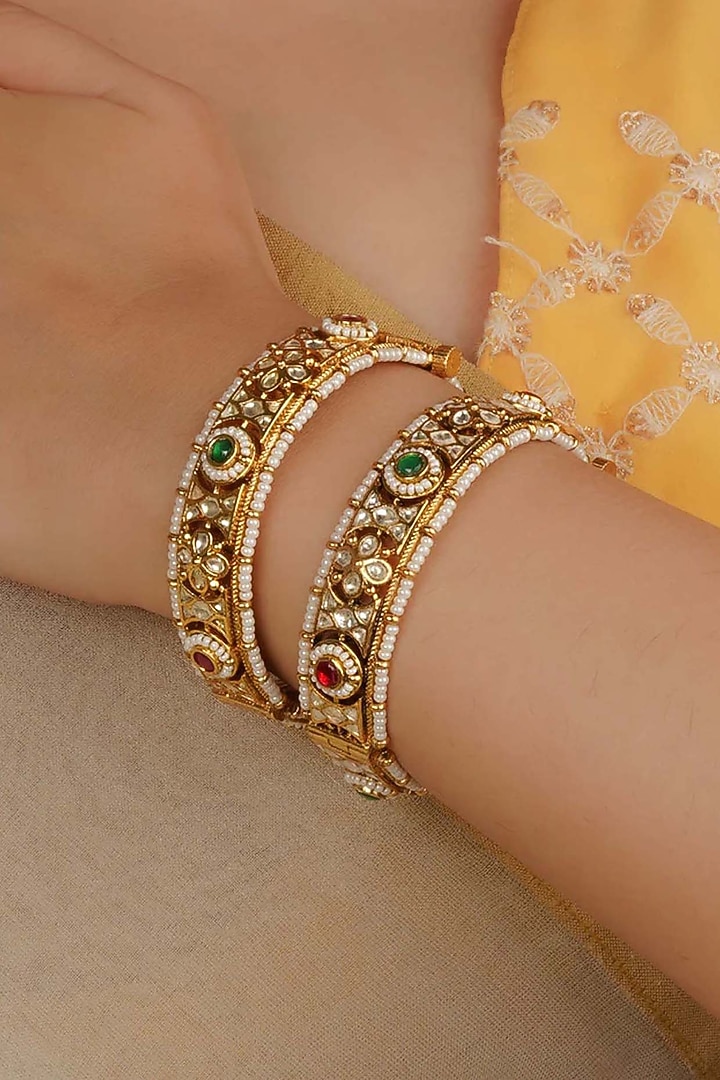 Gold Plated Uncut Polki & Beaded Jadau Bangles (Set Of 2) by Mortantra at Pernia's Pop Up Shop