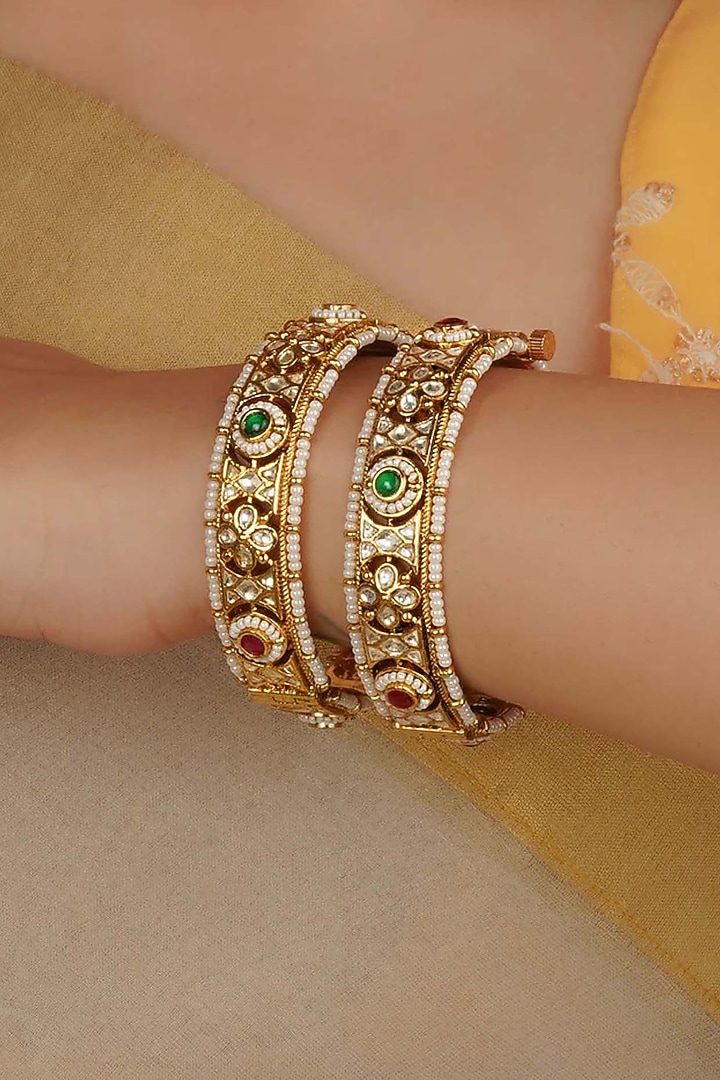 Gold Plated Uncut Polki & Beaded Jadau Bangles (Set Of 2) by Mortantra at Pernia's Pop Up Shop