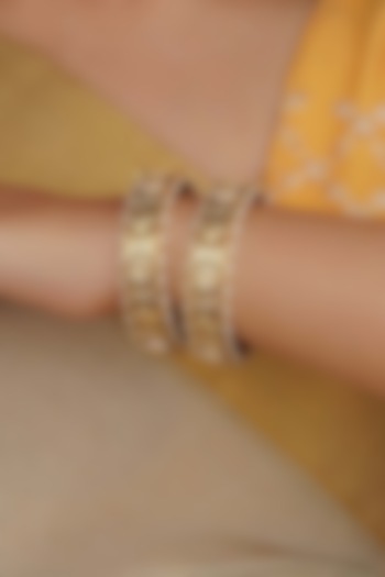 Gold Plated Uncut Polki & Beaded Jadau Bangles (Set Of 2) by Mortantra at Pernia's Pop Up Shop
