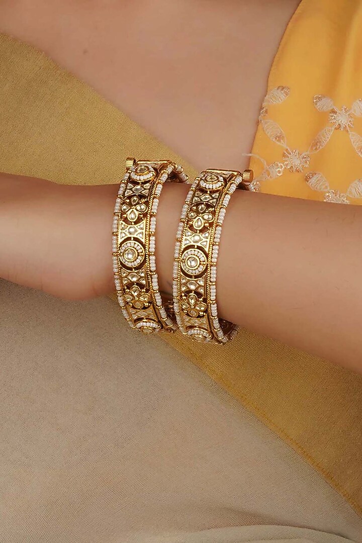 Gold Plated Uncut Polki & Beaded Jadau Bangles (Set Of 2) by Mortantra at Pernia's Pop Up Shop