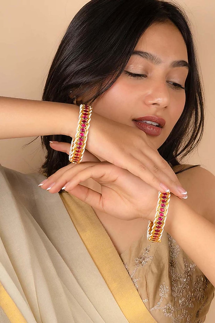 Gold Plated Uncut Polki & Beaded Jadau Bangles (Set Of 2) by Mortantra at Pernia's Pop Up Shop