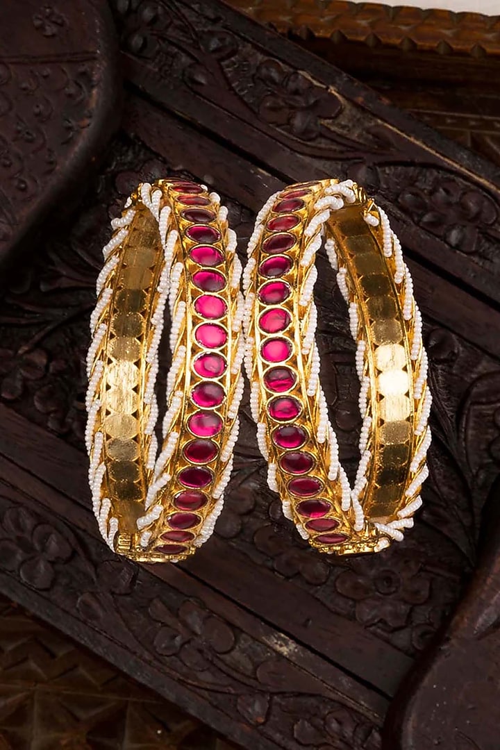 Gold Plated Uncut Polki & Beaded Jadau Bangles (Set Of 2) by Mortantra at Pernia's Pop Up Shop